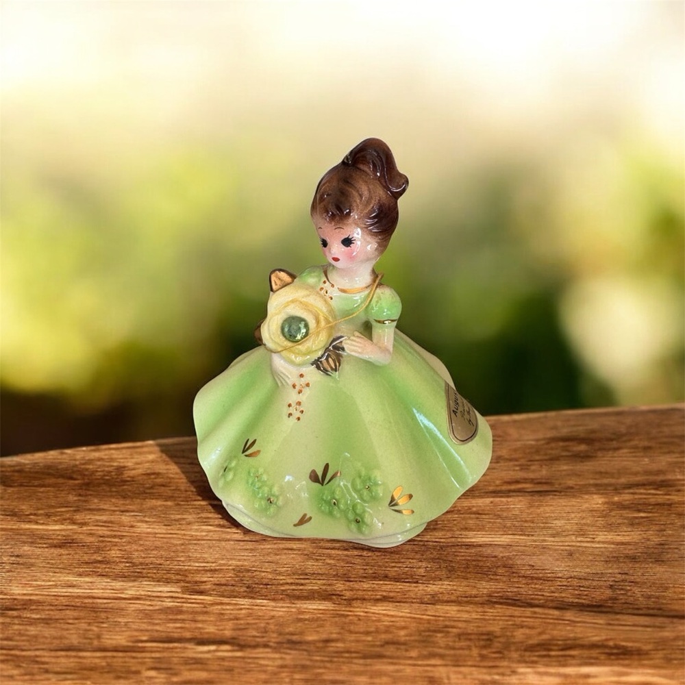 A Josep Original Charming Green Figurine with Floral Details